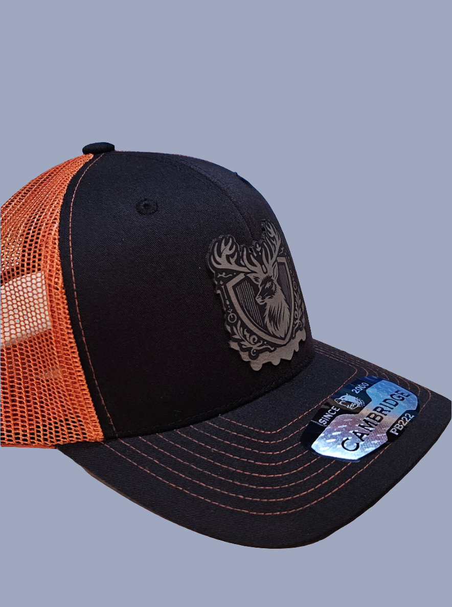 Black/ Burnt orange trucker hat