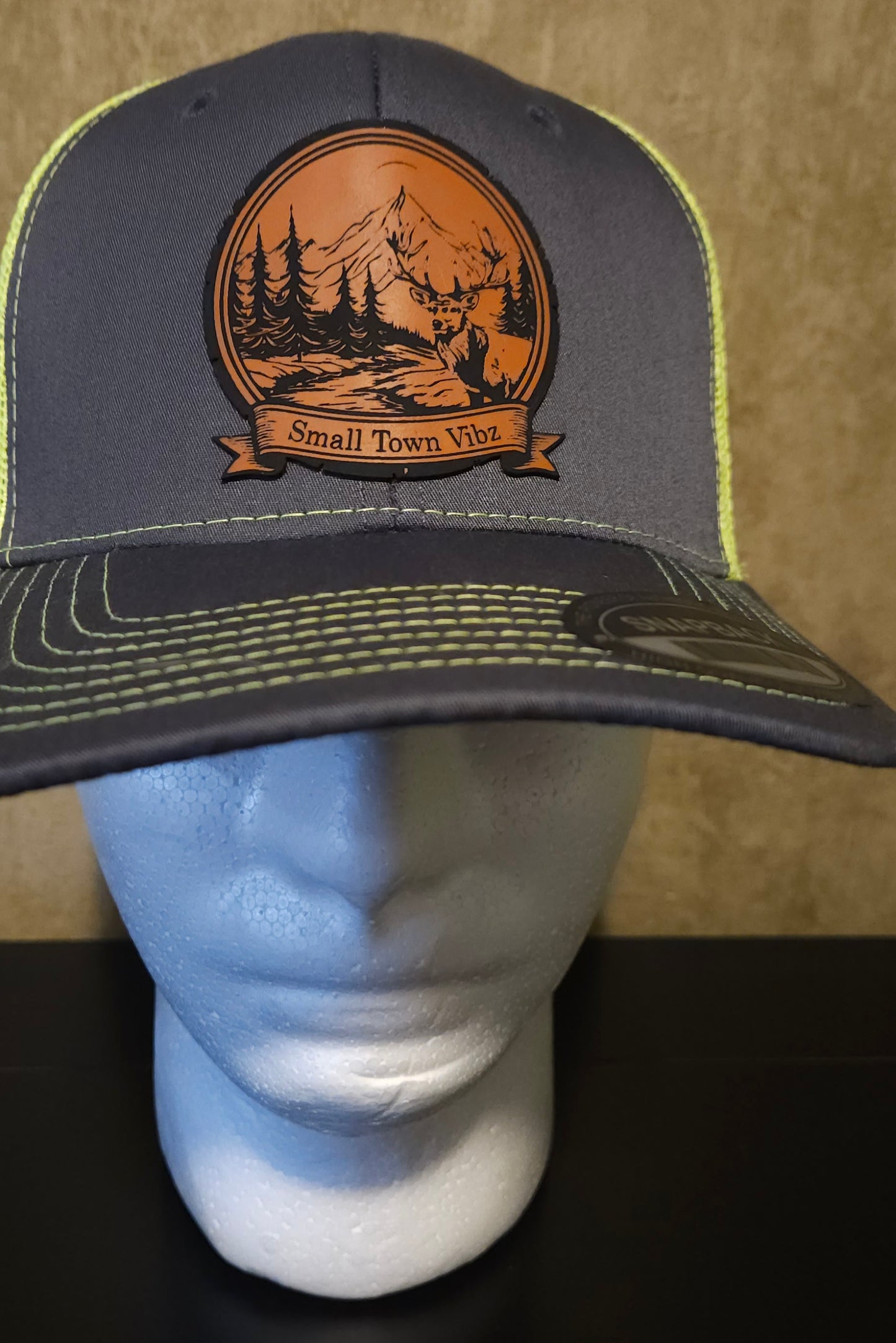 Leather patch trucker hat